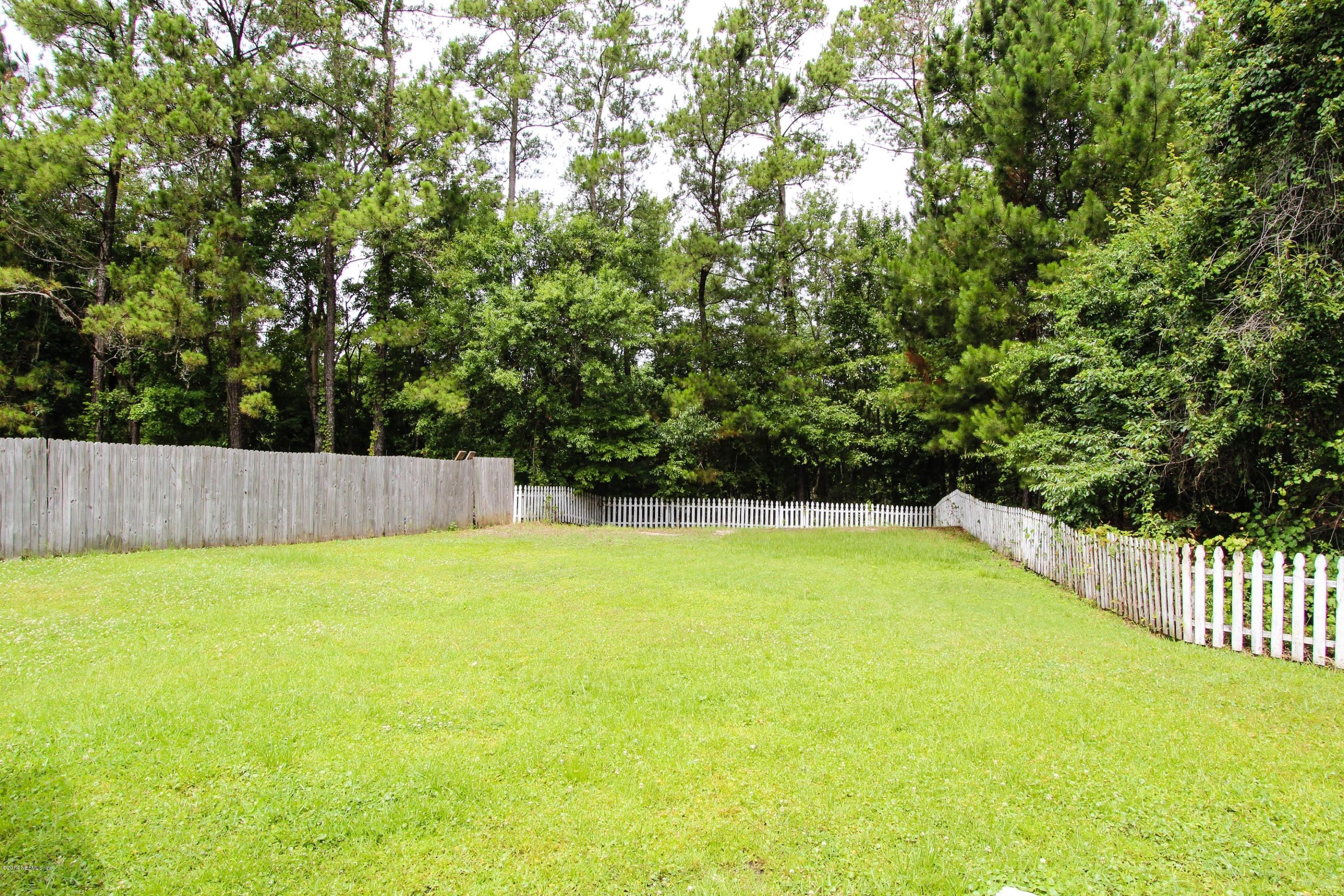 2750 Archer Street Middleburg, FL 32068 - Photo 29 of 34 a view of a bathtub in a yard