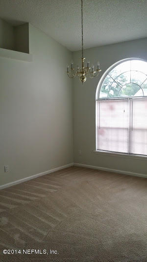 2750 Archer Street Middleburg, FL 32068 - Photo 3 of 34 an empty room with a window