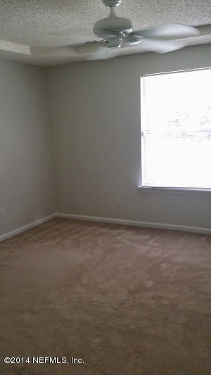 2750 Archer Street Middleburg, FL 32068 - Photo 8 of 34 a view of a room that has a window in it