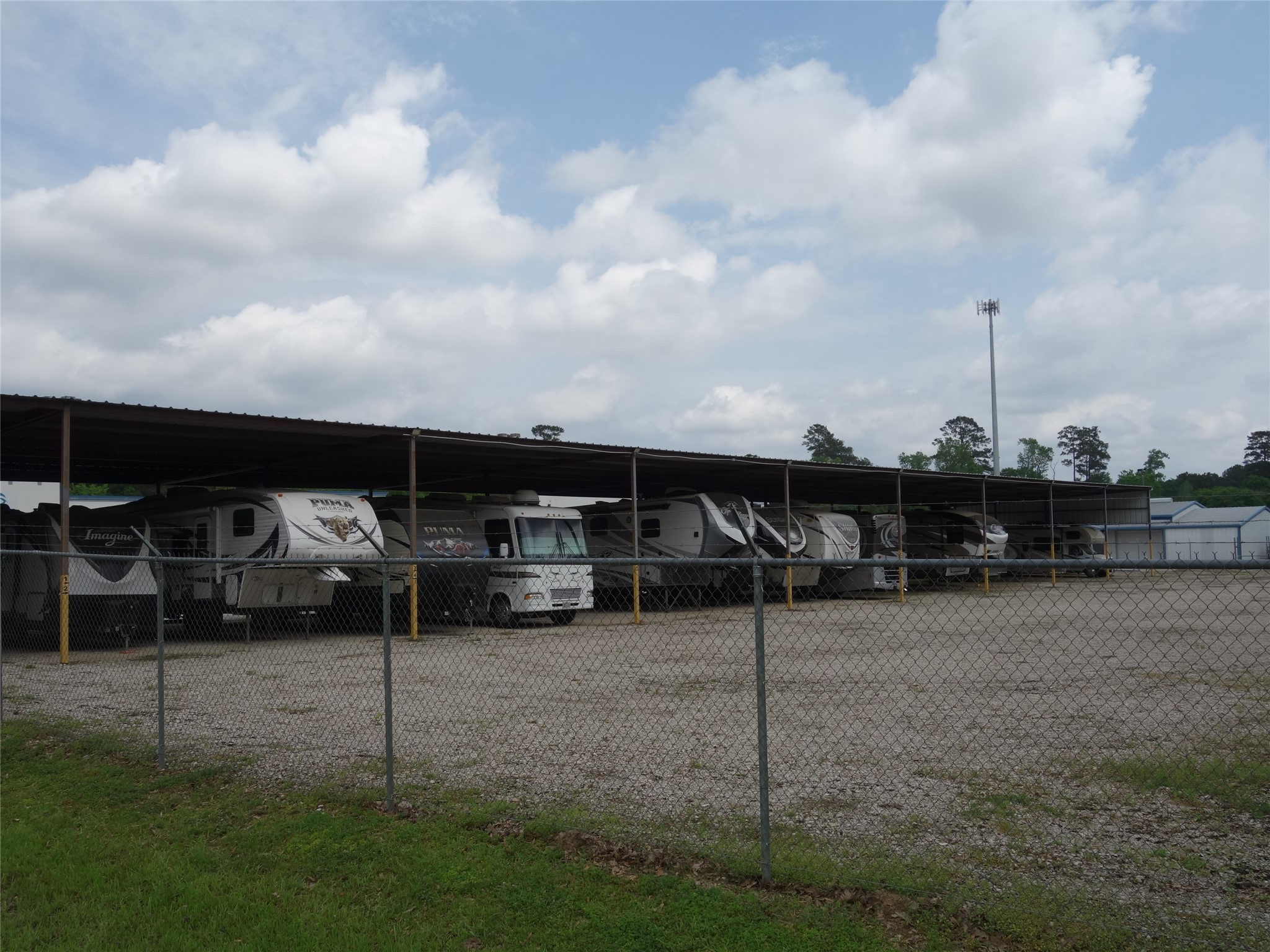 3620 Honea Egypt Road Montgomery, TX 77316 - Photo 3 of 6 a view of a house with backyard and car parked