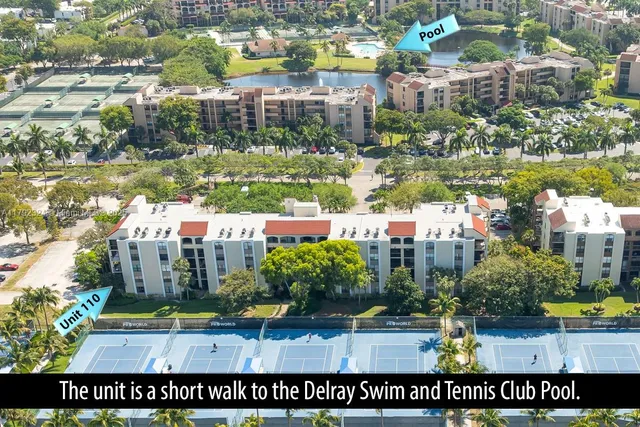 a sign that is sitting in the middle of a lake