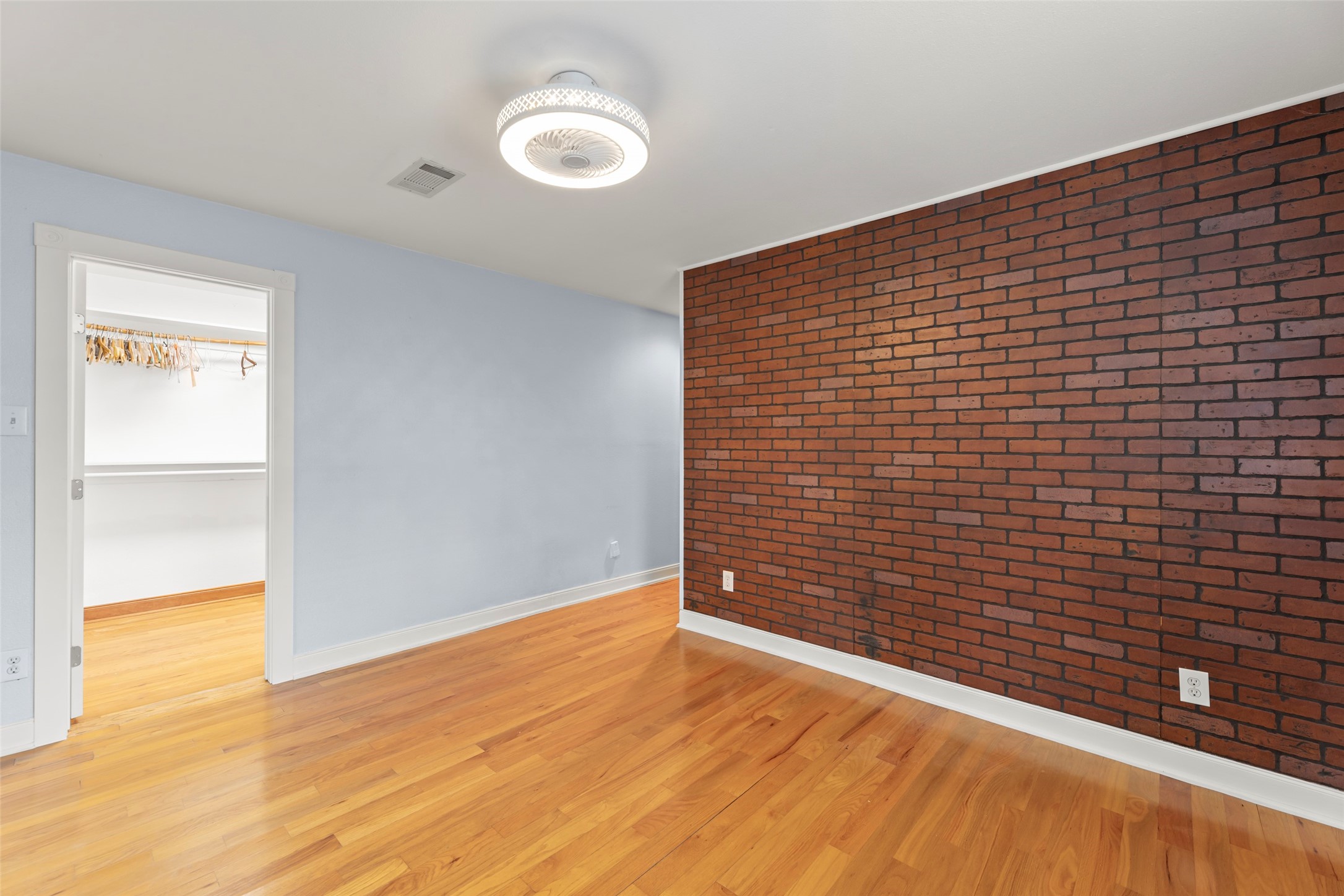 2209 Portsmouth Street Houston, TX 77098 - Photo 21 of 28 a view of wooden floor