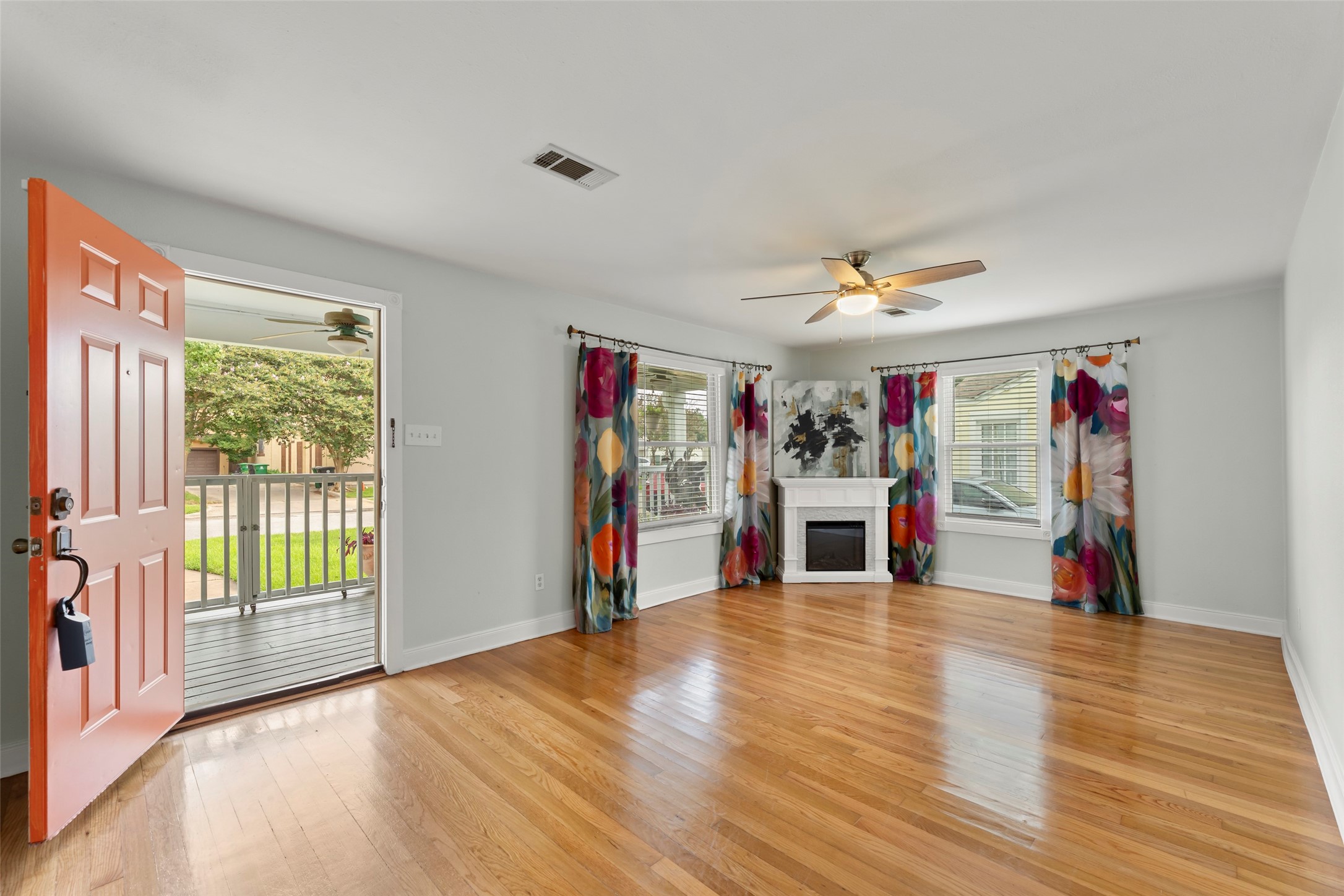 2209 Portsmouth Street Houston, TX 77098 - Photo 3 of 28 a living room with furniture and a wooden floor