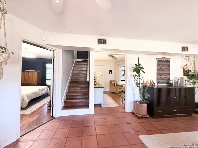 a view of entryway with livingroom and stairs