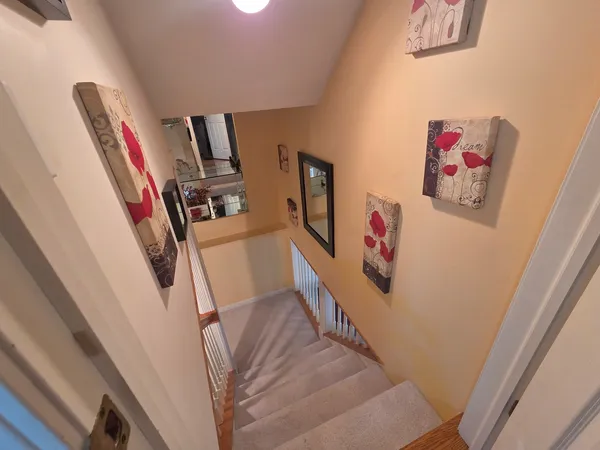 a view of an entryway with hallway