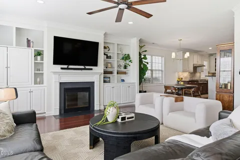a kitchen with stainless steel appliances granite countertop a stove refrigerator sink and cabinets