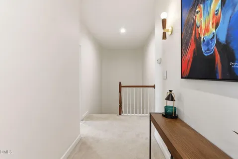 a bathroom with a toilet and a vanity