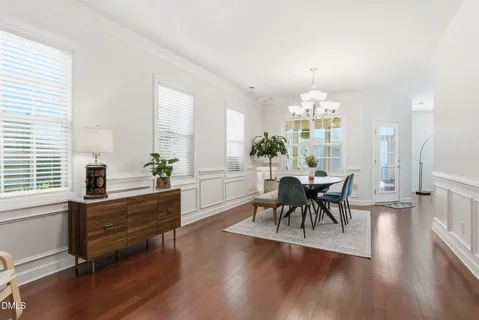 a living room with fireplace furniture and a flat screen tv