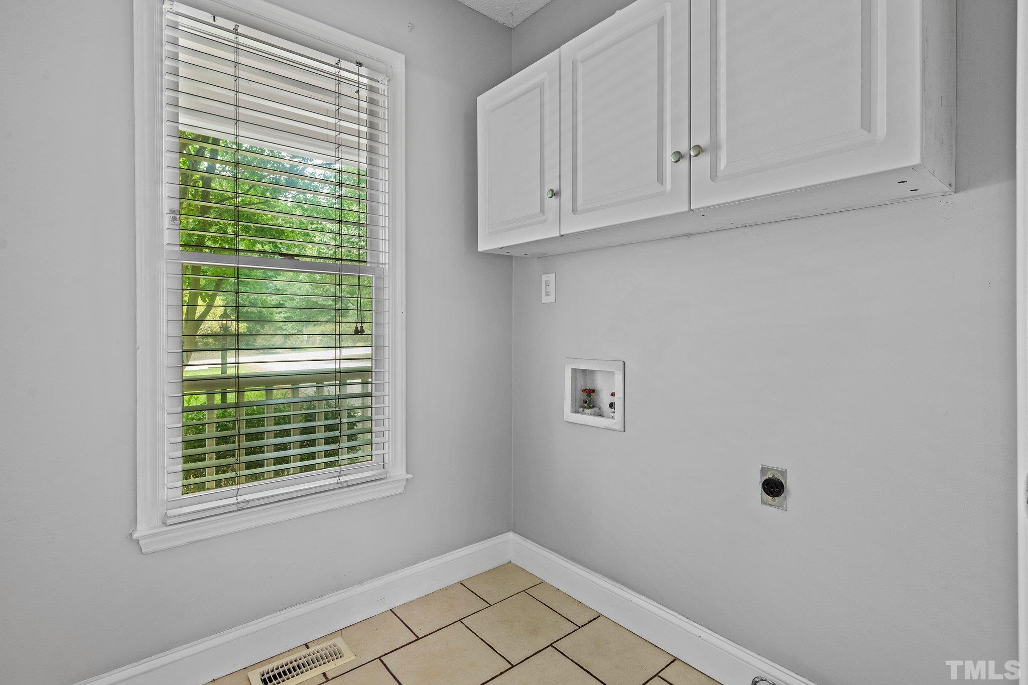 4209 Rockside Hills Drive Raleigh, NC 27603 - Photo 11 of 24 a view of empty room with window