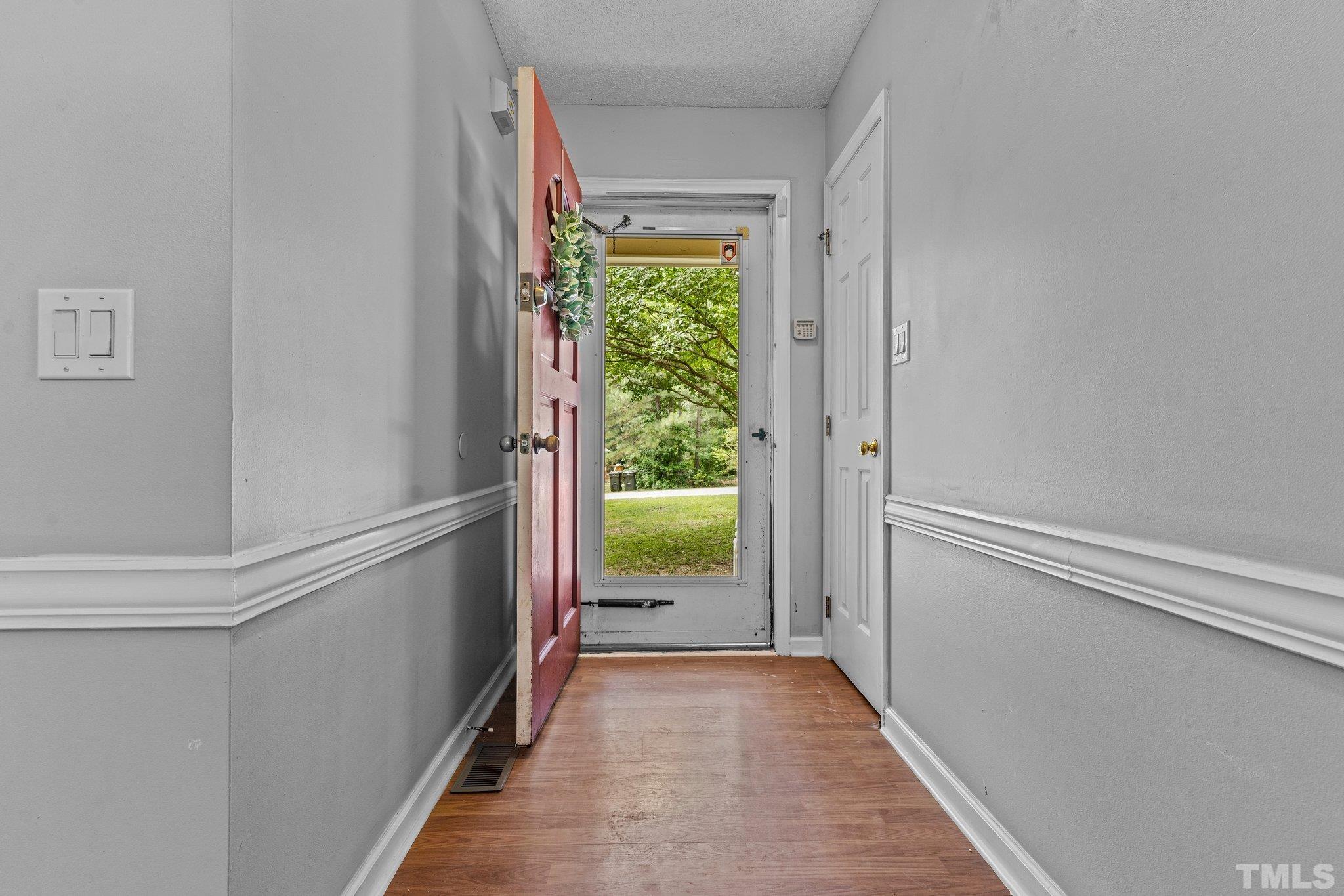 4209 Rockside Hills Drive Raleigh, NC 27603 - Photo 3 of 24 a view of an entryway