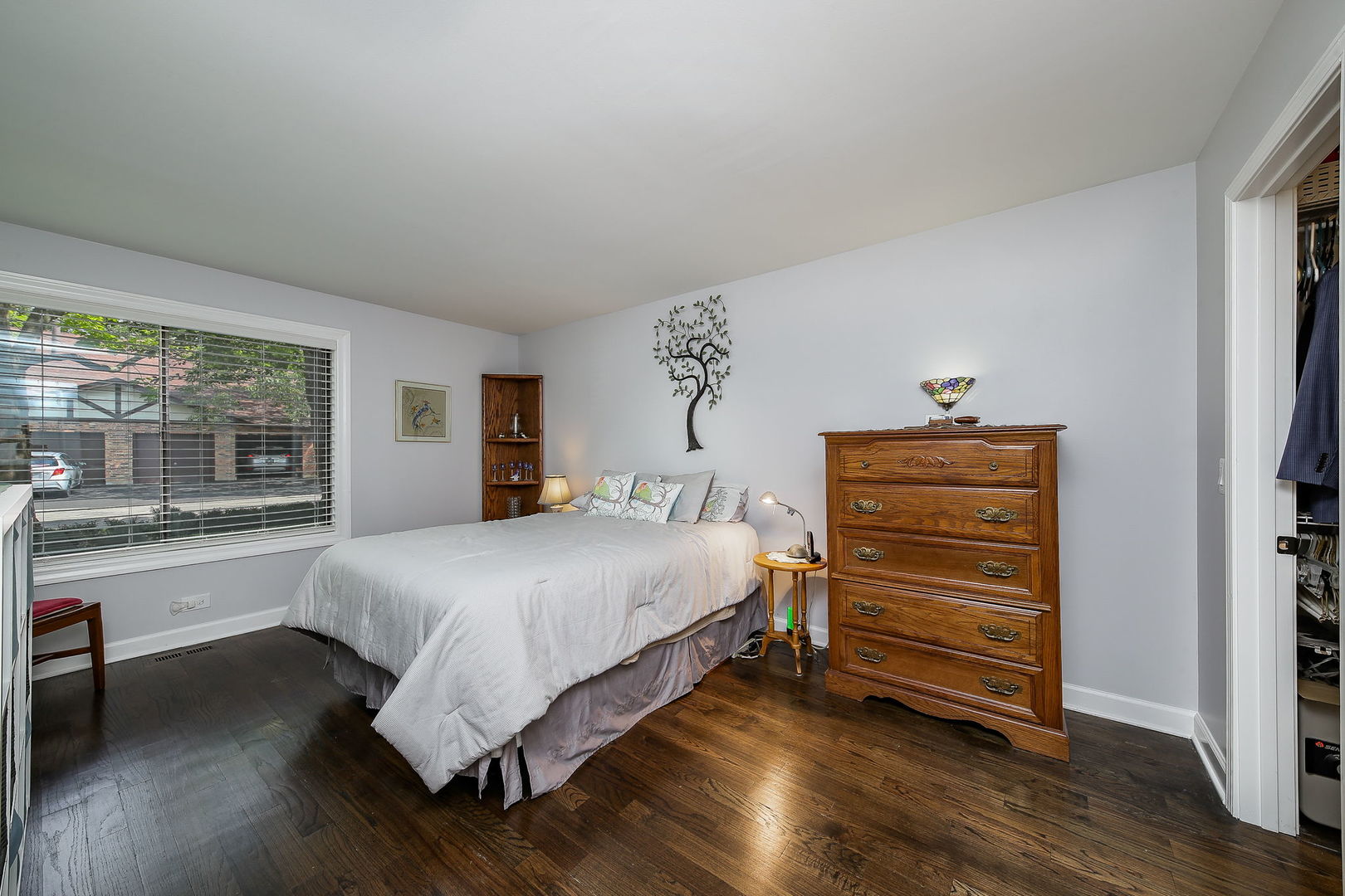 6230 Trinity Drive, Unit 1C Lisle, IL 60532 - Photo 8 of 27 a bedroom with a bed and a large window