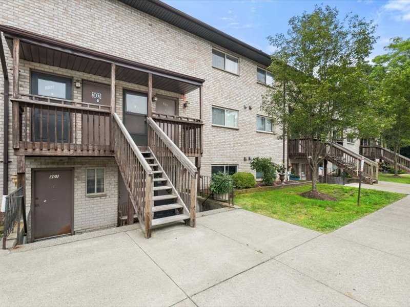 26 Cooper Road, Unit 306 Poughkeepsie, NY 12603 - Photo 2 of 16 a view of a house with backyard and deck
