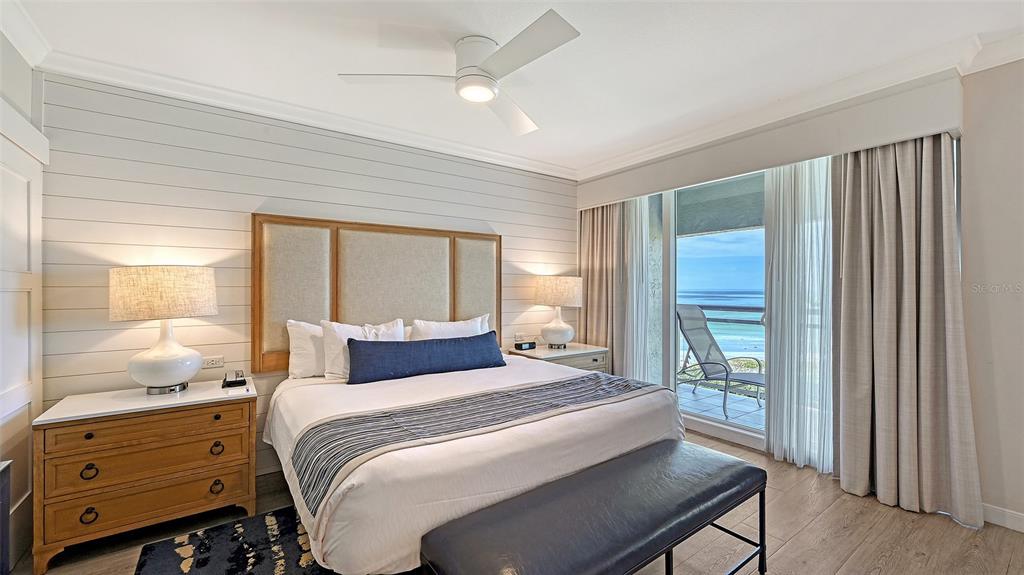 240 Sands Point Road, Unit 4206 Longboat Key, FL 34228 - Photo 12 of 41 a bedroom with a large bed and a window
