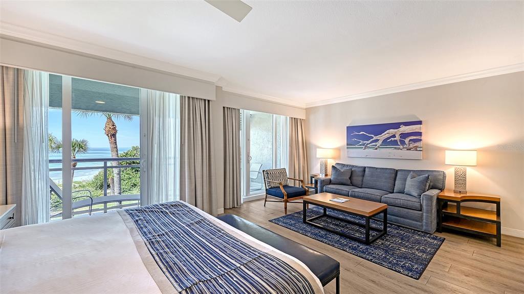 240 Sands Point Road, Unit 4206 Longboat Key, FL 34228 - Photo 13 of 41 a bedroom with furniture and a window