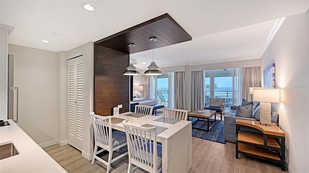 240 Sands Point Road, Unit 4206 Longboat Key, FL 34228 - Photo 4 of 41 a view of a livingroom with furniture and window