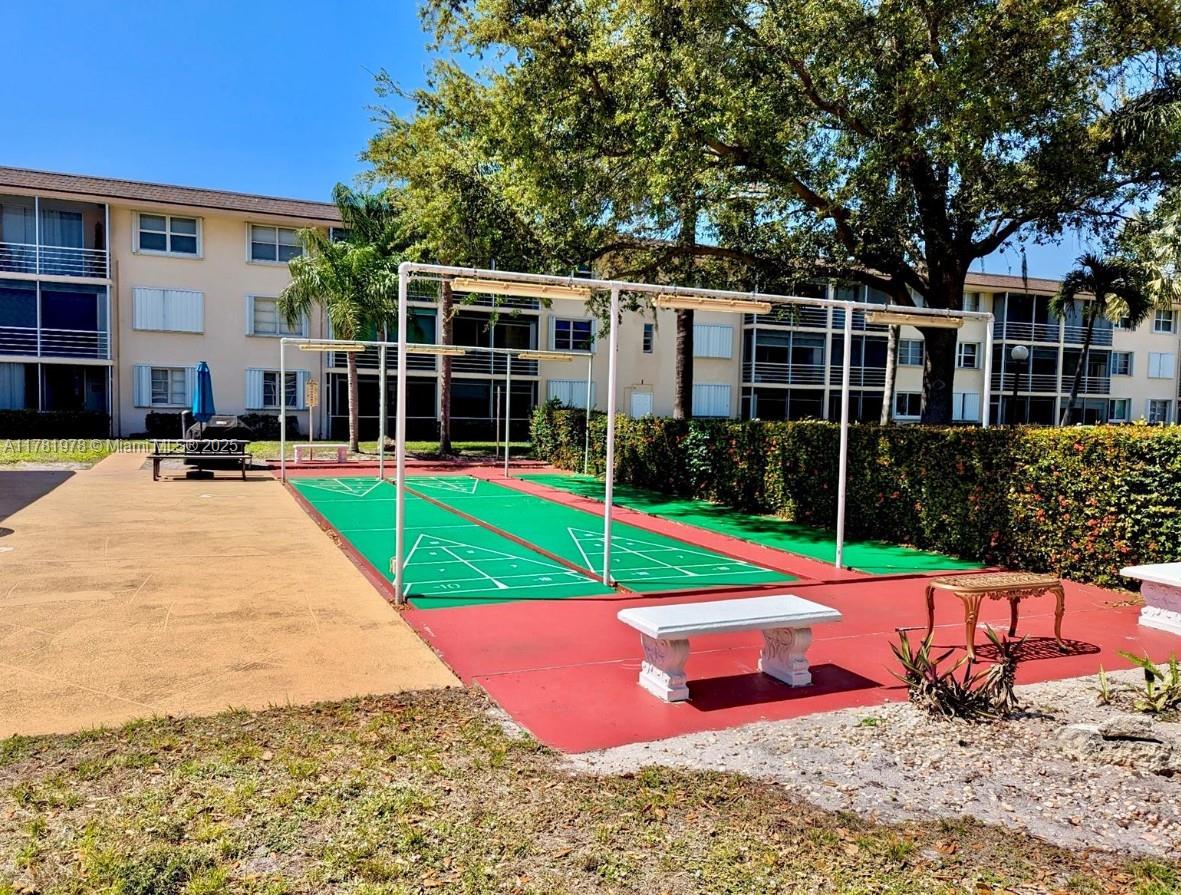 4500 North Federal Highway, Unit 352F Lighthouse Point, FL 33064 - Photo 28 of 32 a view of outdoor space deck and swimming pool
