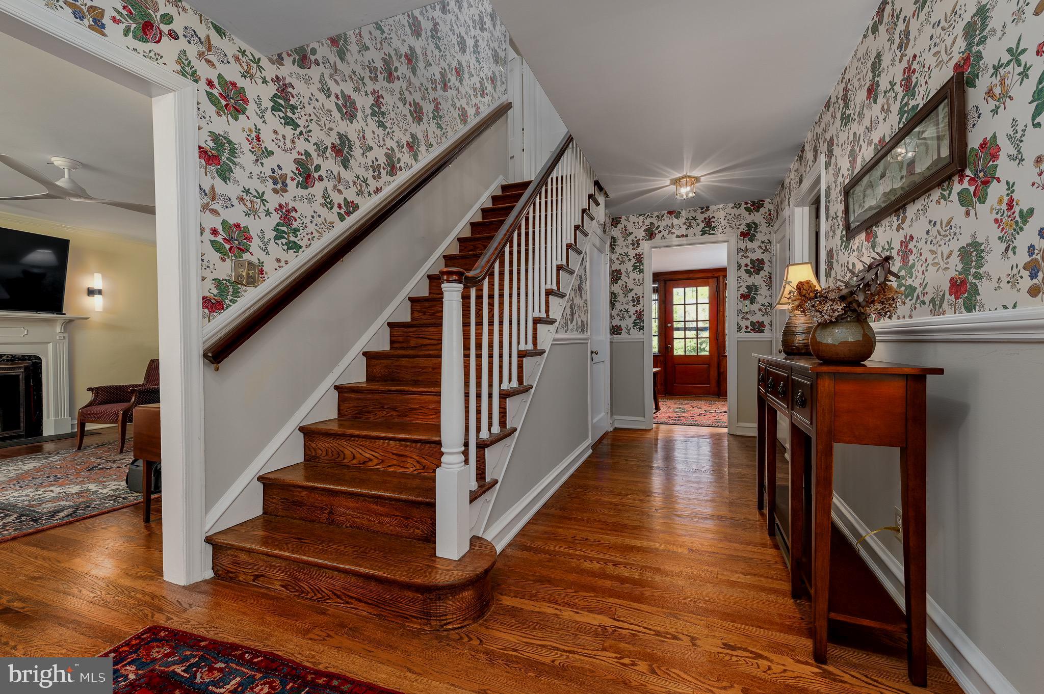 105 Stratford Road Wallingford, PA 19086 - Photo 20 of 39 a view of entryway and hall with wooden floor