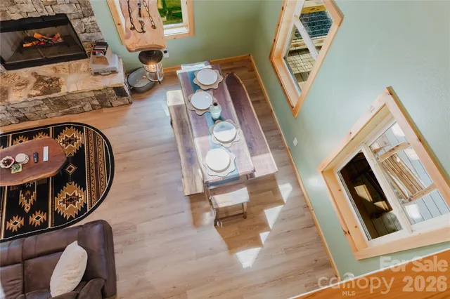 an entryway with wooden floor