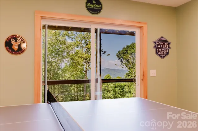 a view of a room with a large window