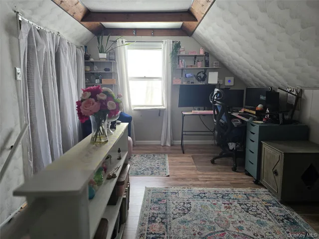 a room with furniture and a window