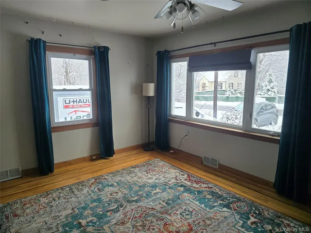 a view of an empty room with window