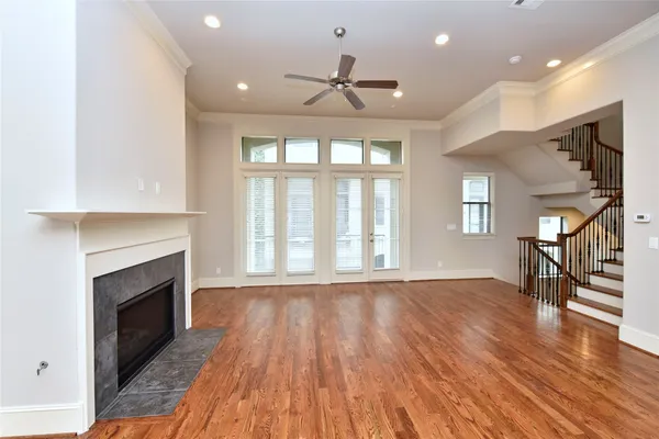 a view of kitchen with sink and wooden floor