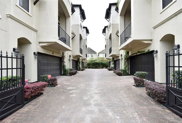 a view of a street with sitting area