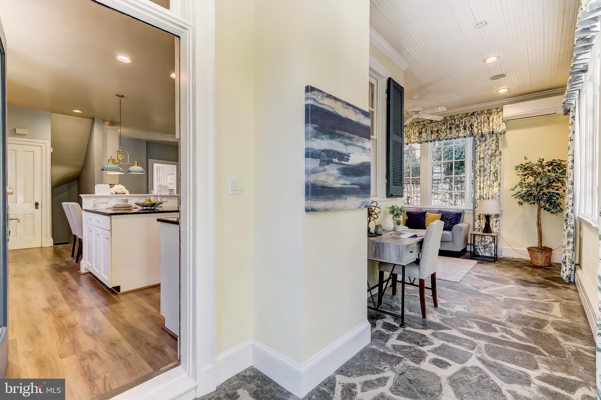 500 Overhill Road Baltimore, MD 21210 - Photo 25 of 67 Enchanting sunroom - stone floor...