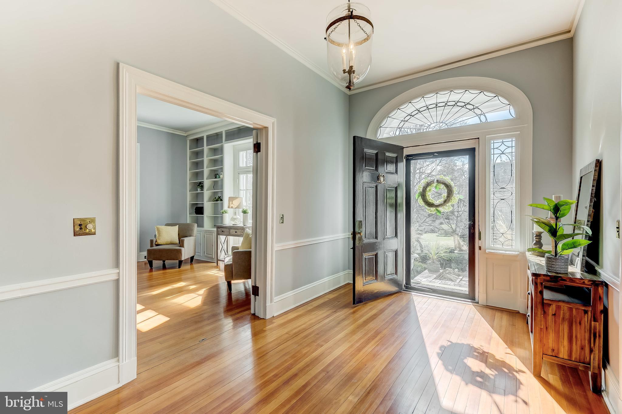 500 Overhill Road Baltimore, MD 21210 - Photo 5 of 67 Leaded glass fanlight, original pendant light