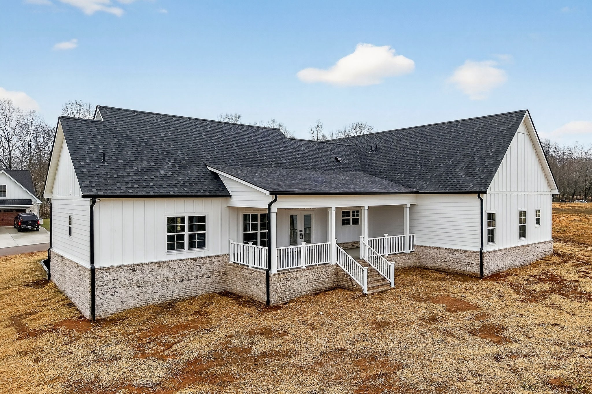 6955 Sweet Magnolia Way Baxter, TN 38544 - Photo 14 of 53 a view of a house with wooden fence