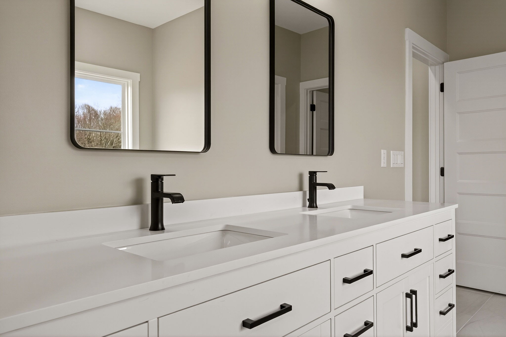 6955 Sweet Magnolia Way Baxter, TN 38544 - Photo 19 of 53 a bathroom with sink and mirror