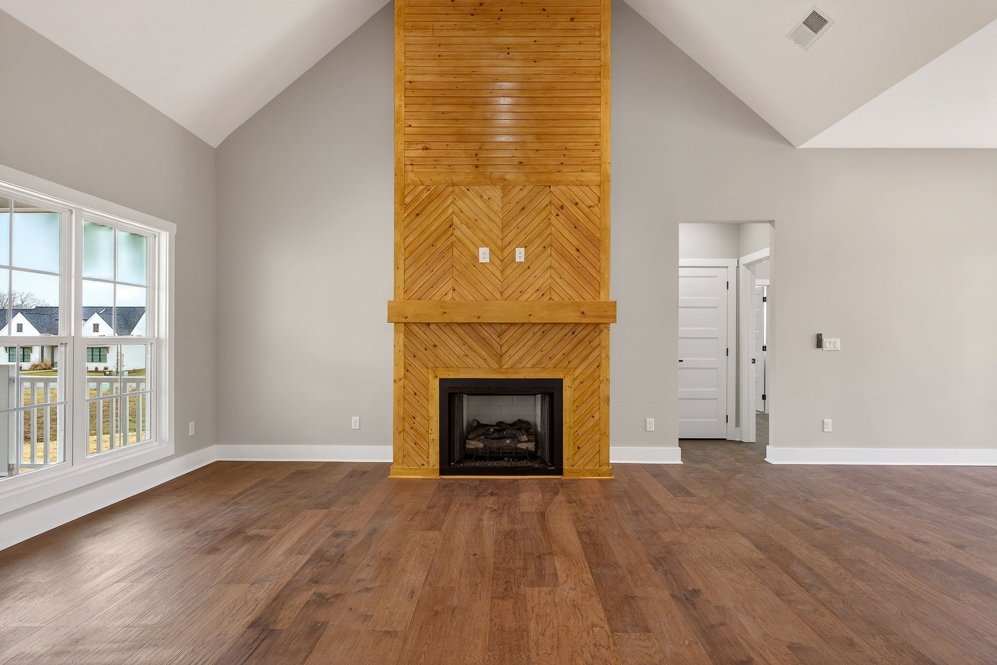 6955 Sweet Magnolia Way Baxter, TN 38544 - Photo 28 of 53 an empty room with windows and fireplace