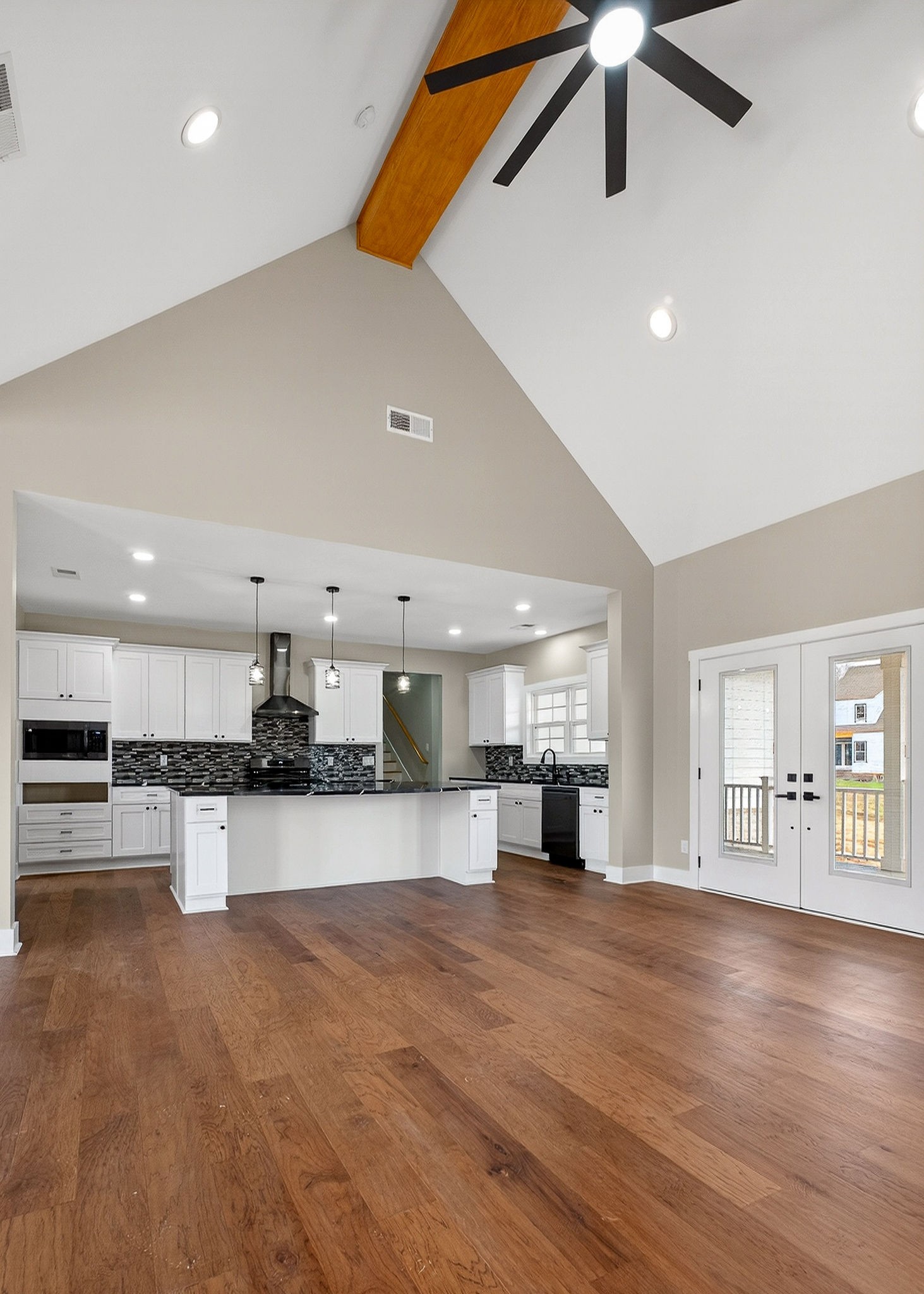 6955 Sweet Magnolia Way Baxter, TN 38544 - Photo 31 of 53 a view of a kitchen with a sink and a stove top oven