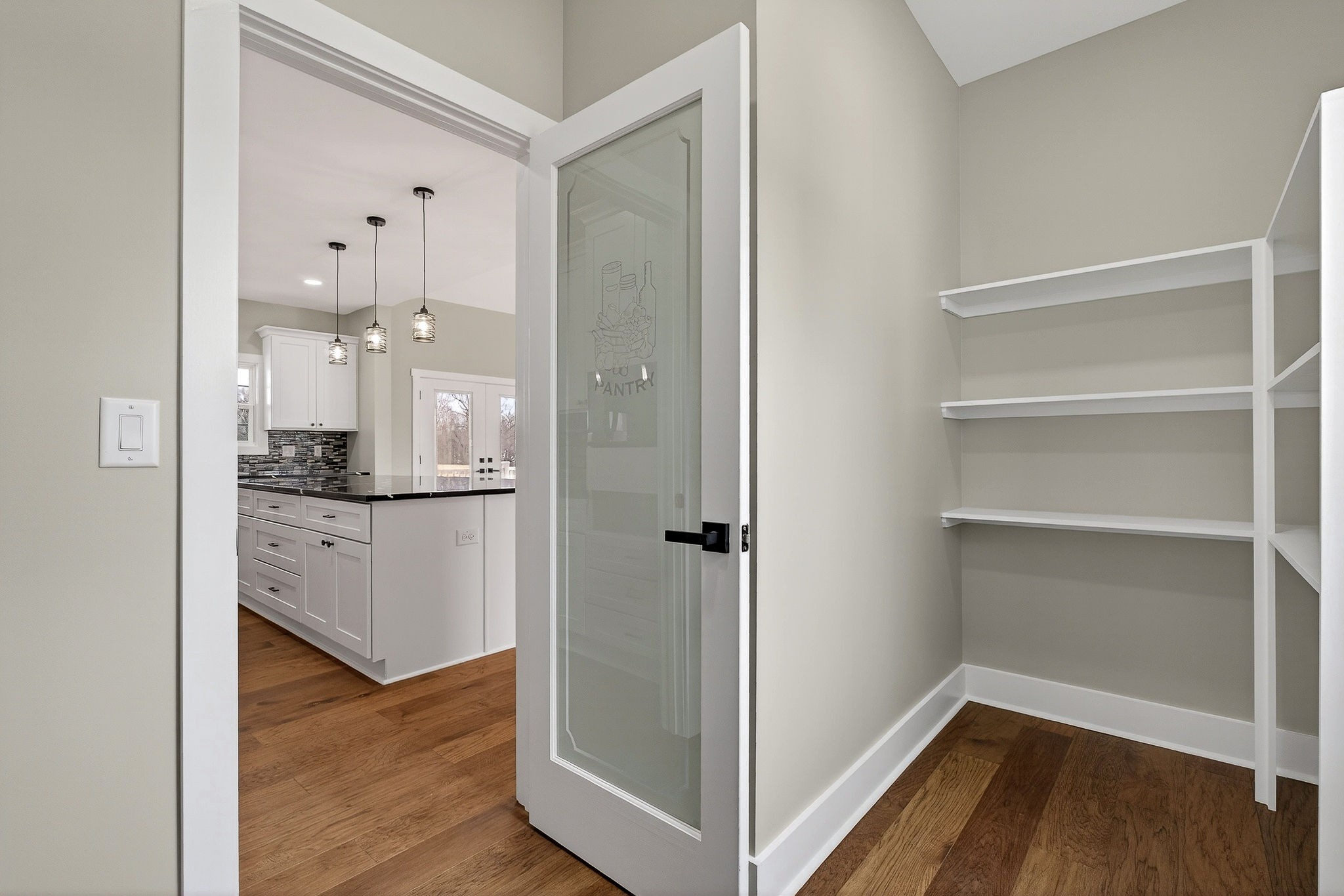 6955 Sweet Magnolia Way Baxter, TN 38544 - Photo 33 of 53 a view of a hallway with wooden floor and closet