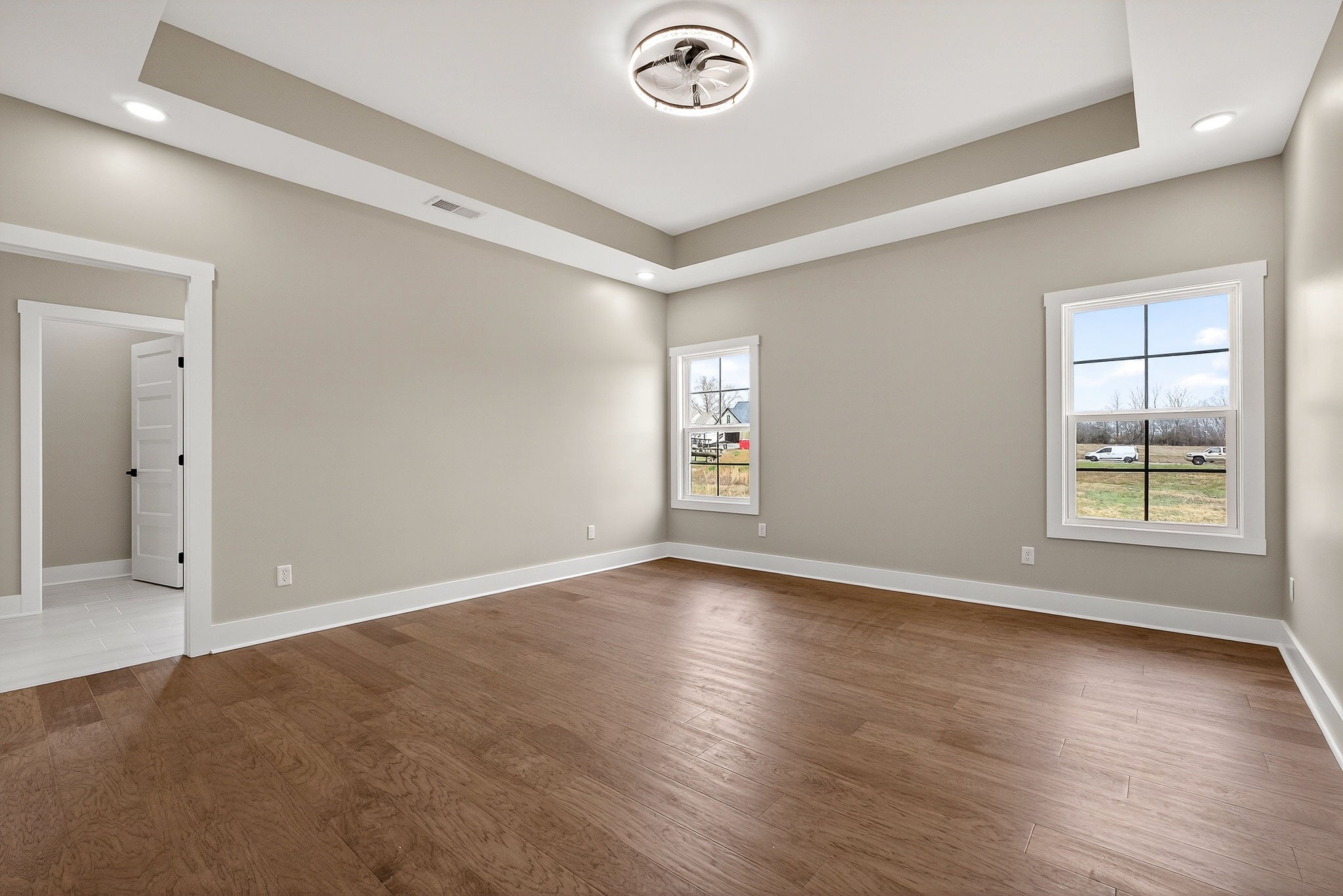 6955 Sweet Magnolia Way Baxter, TN 38544 - Photo 4 of 53 an empty room with windows
