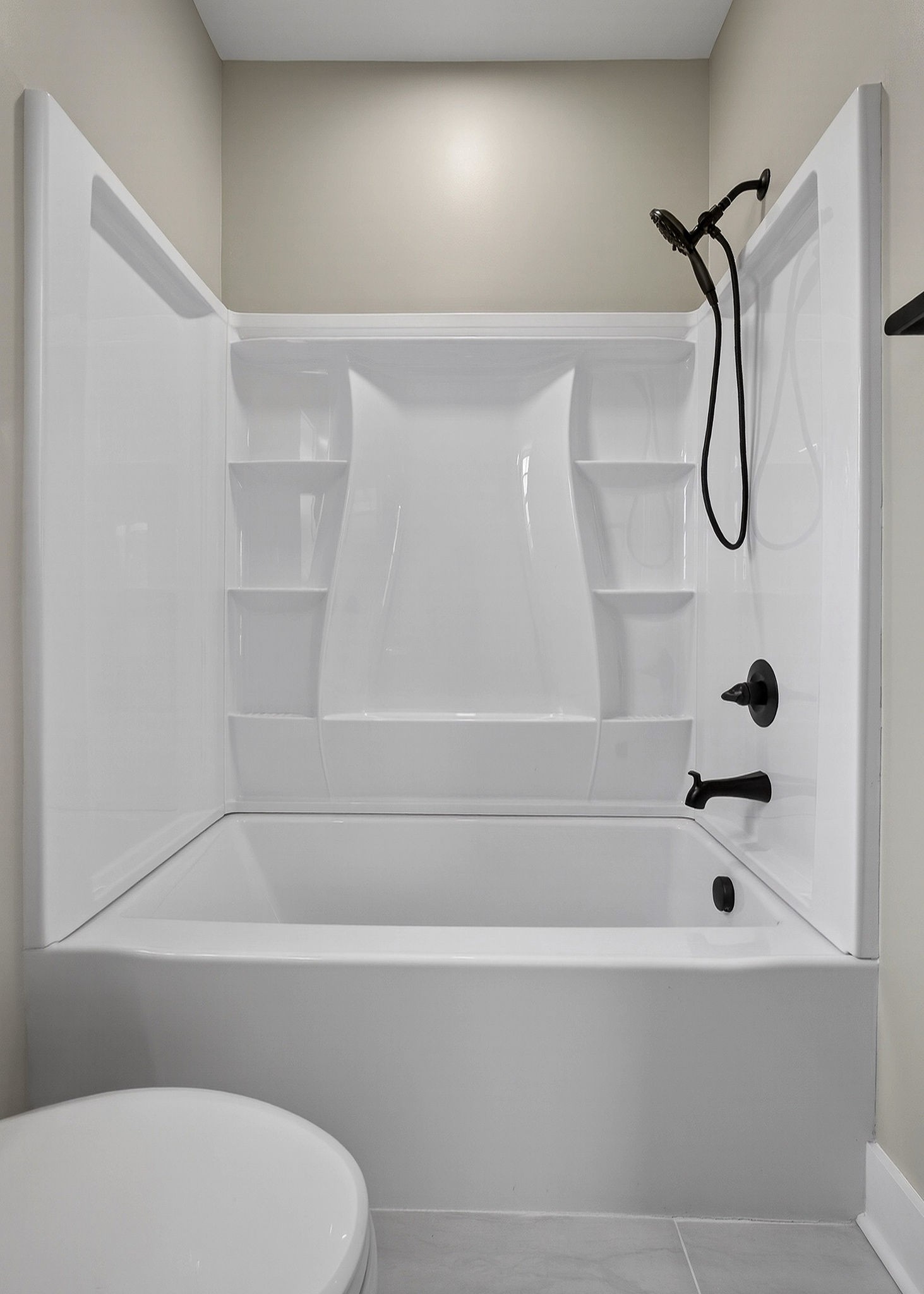 6955 Sweet Magnolia Way Baxter, TN 38544 - Photo 43 of 53 a bathroom with a bathtub and shower