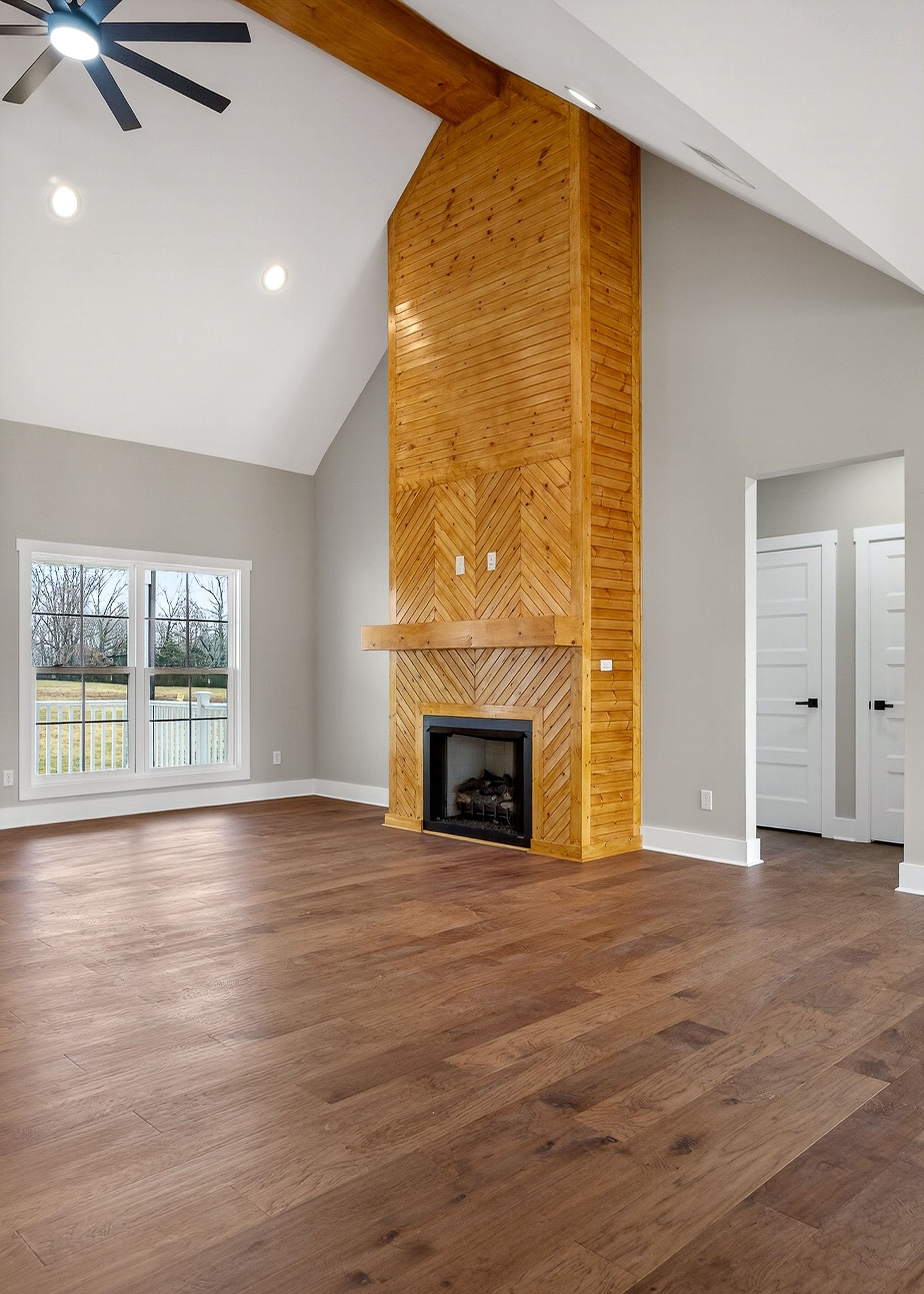 6955 Sweet Magnolia Way Baxter, TN 38544 - Photo 52 of 53 a view of an empty room with a fireplace and a window