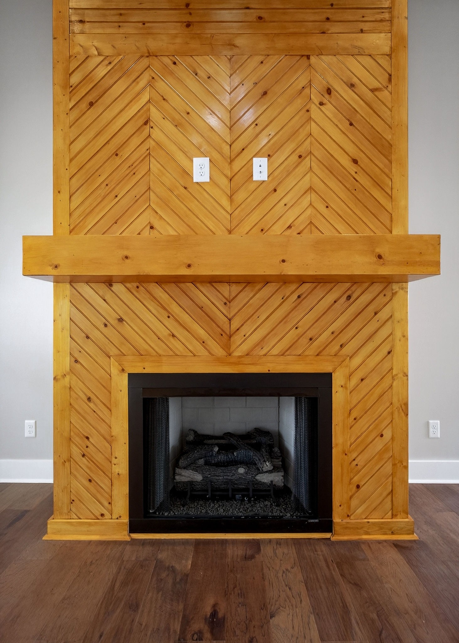 6955 Sweet Magnolia Way Baxter, TN 38544 - Photo 53 of 53 a fireplace with wooden floor