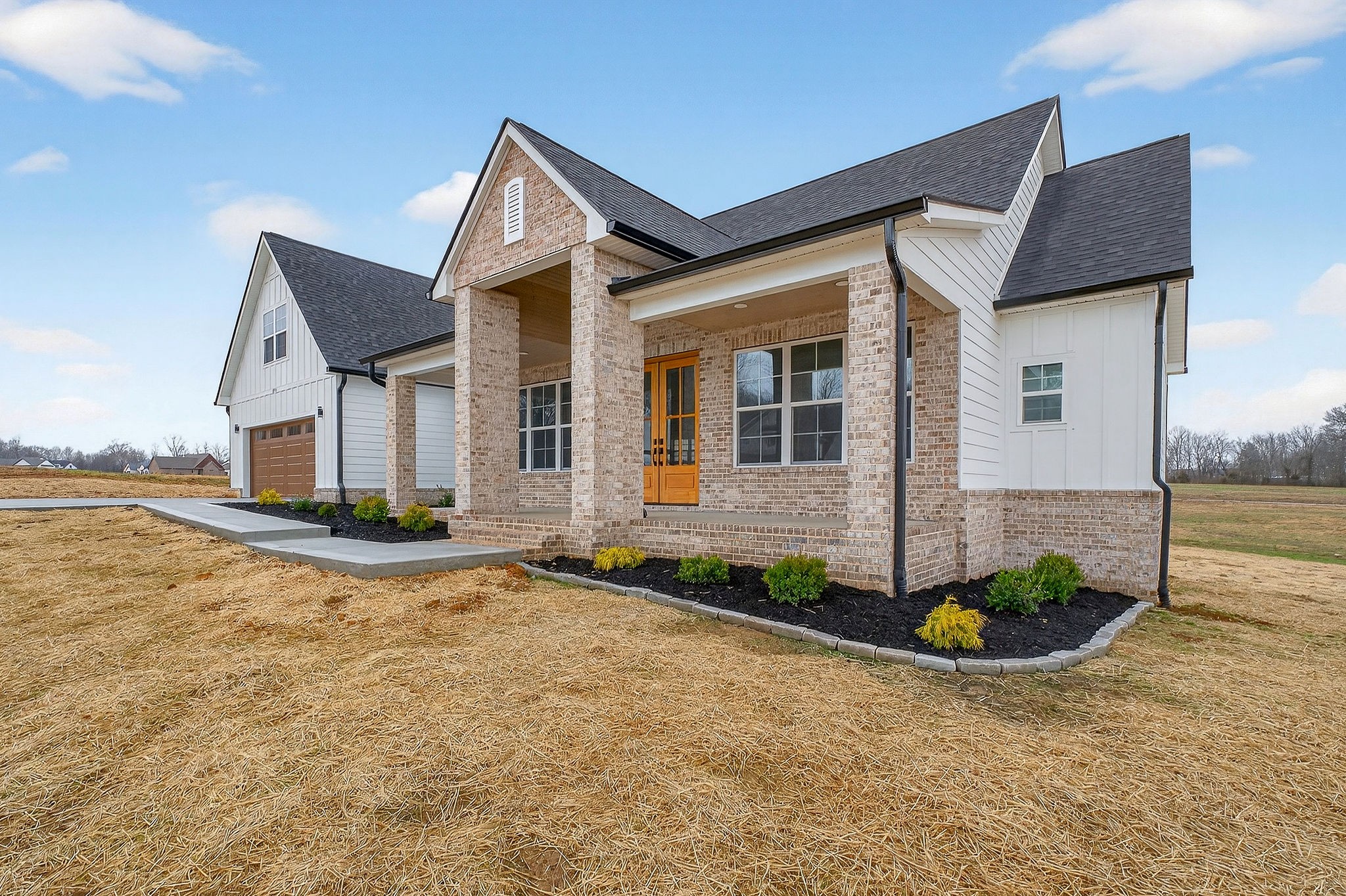 6955 Sweet Magnolia Way Baxter, TN 38544 - Photo 8 of 53 a view of a house with backyard and sitting area