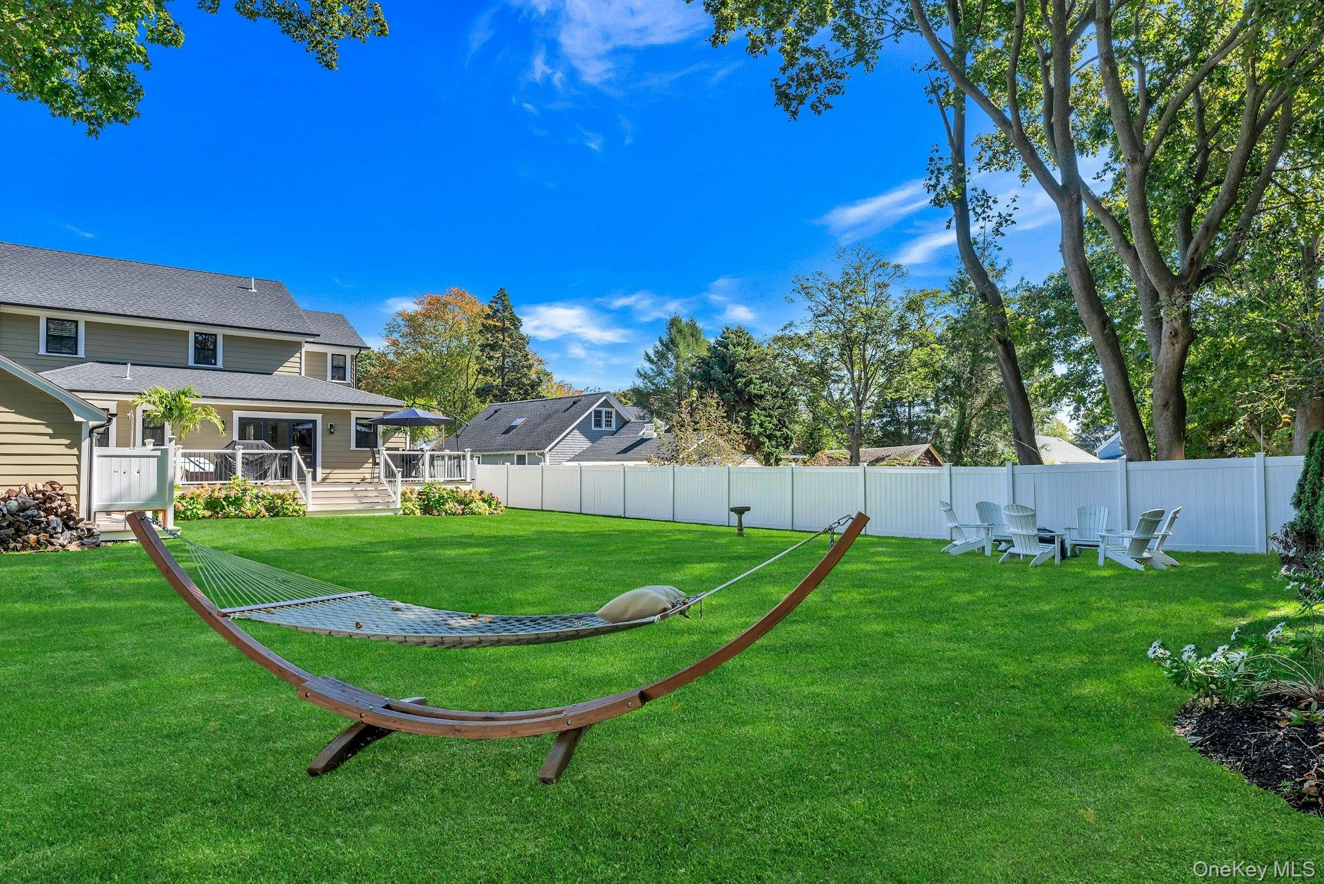 619 Bailey Avenue Greenport, NY 11944 - Photo 29 of 34 Hammock, Lawn, Deck, Back of House
