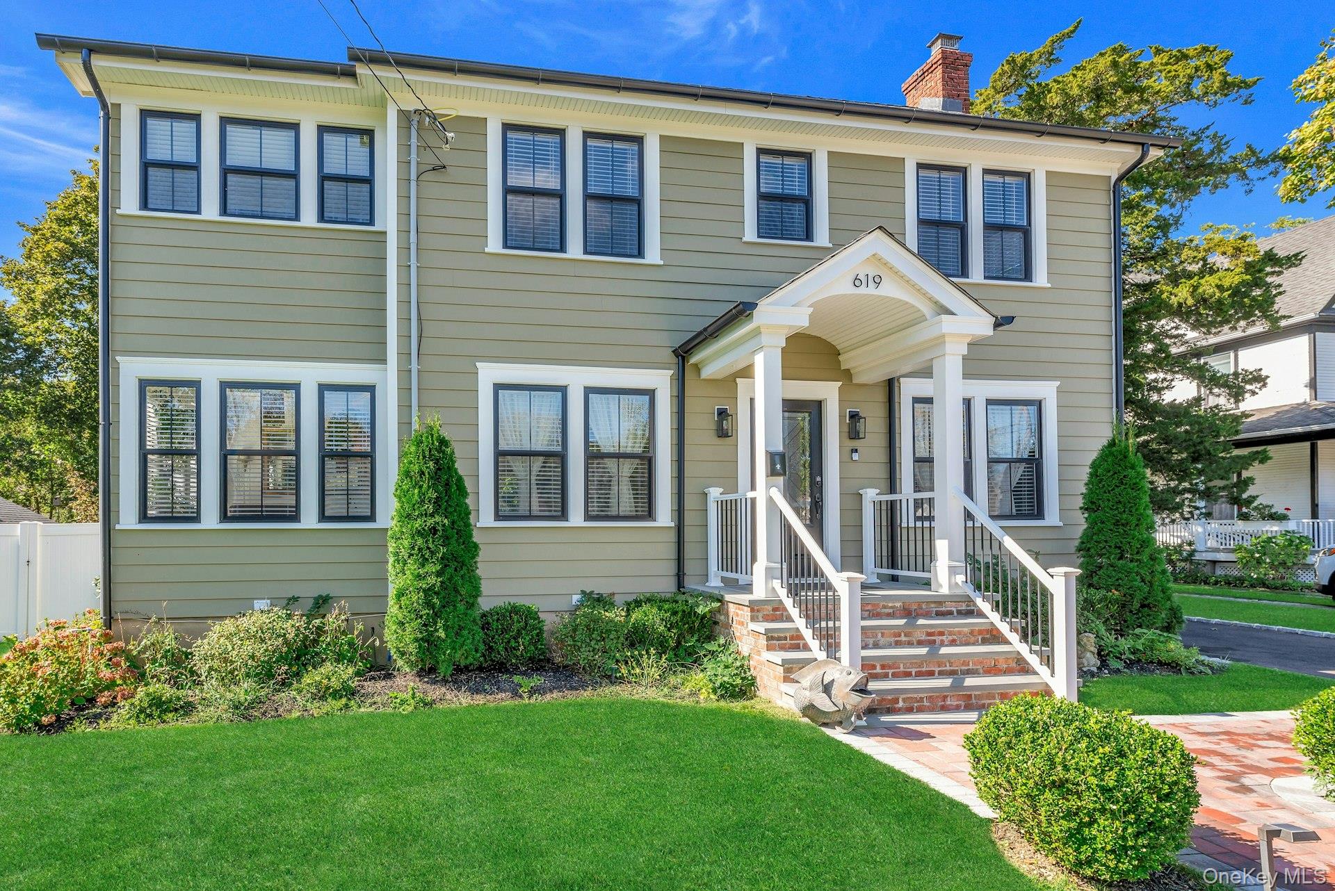 619 Bailey Avenue Greenport, NY 11944 - Photo 33 of 34 Farm House featuring a chimney
