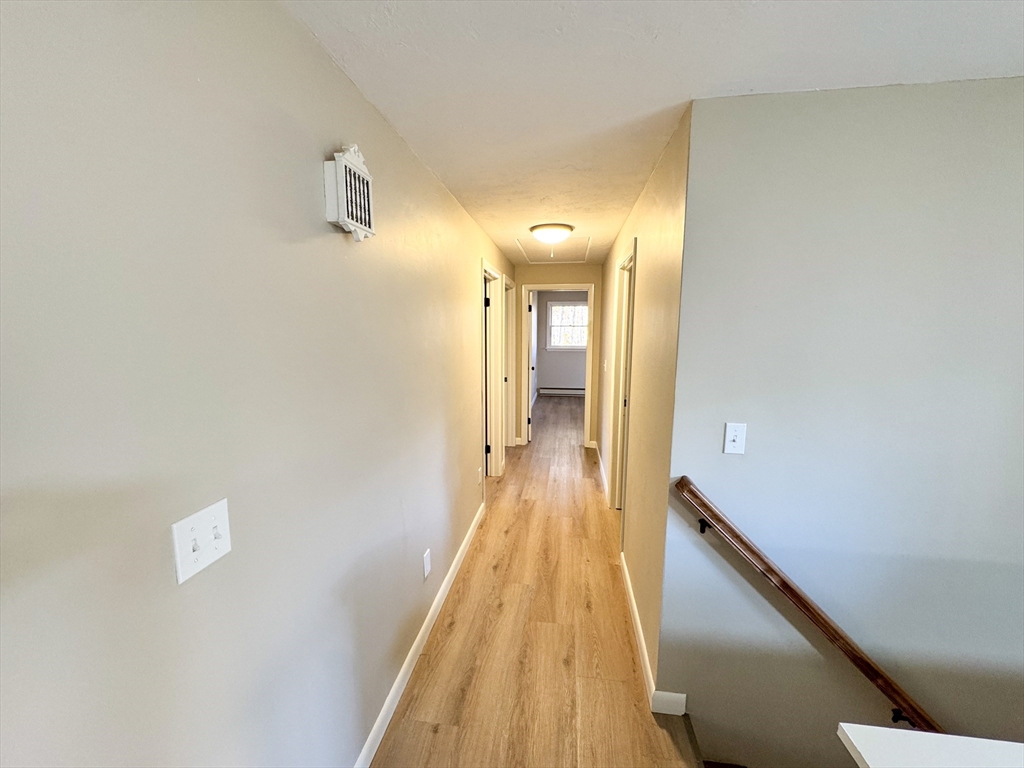 201 Pierce Road West Brookfield, MA 01585 - Photo 13 of 27 a view of a hallway with wooden floor