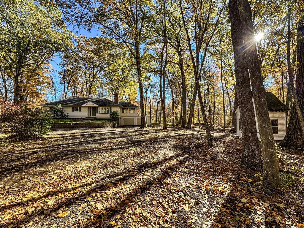 201 Pierce Road West Brookfield, MA 01585 - Photo 2 of 27 a backyard of a house with lots of green space