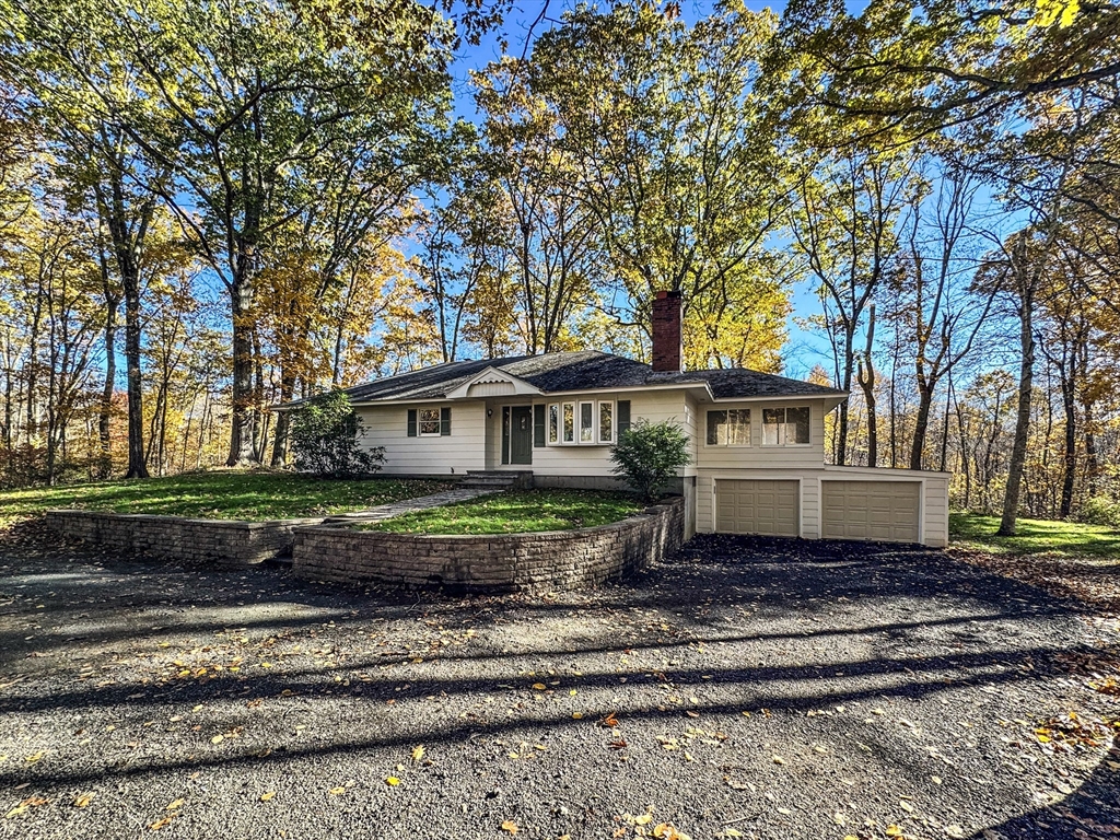 201 Pierce Road West Brookfield, MA 01585 - Photo 21 of 27 a front view of a house with a yard