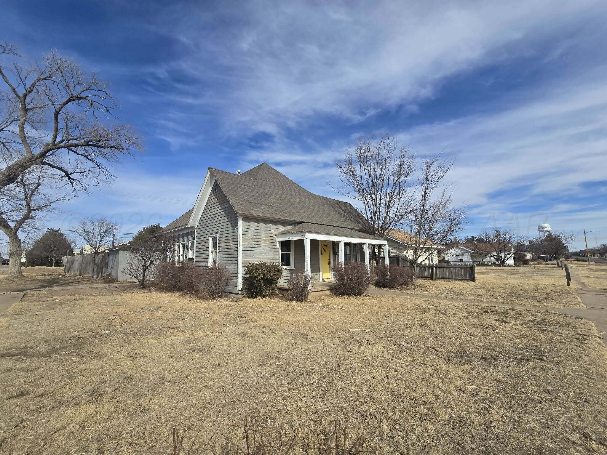 2706 Ridgemere Boulevard Amarillo, TX 79107 - Photo 16 of 49 a view of a house with a yard
