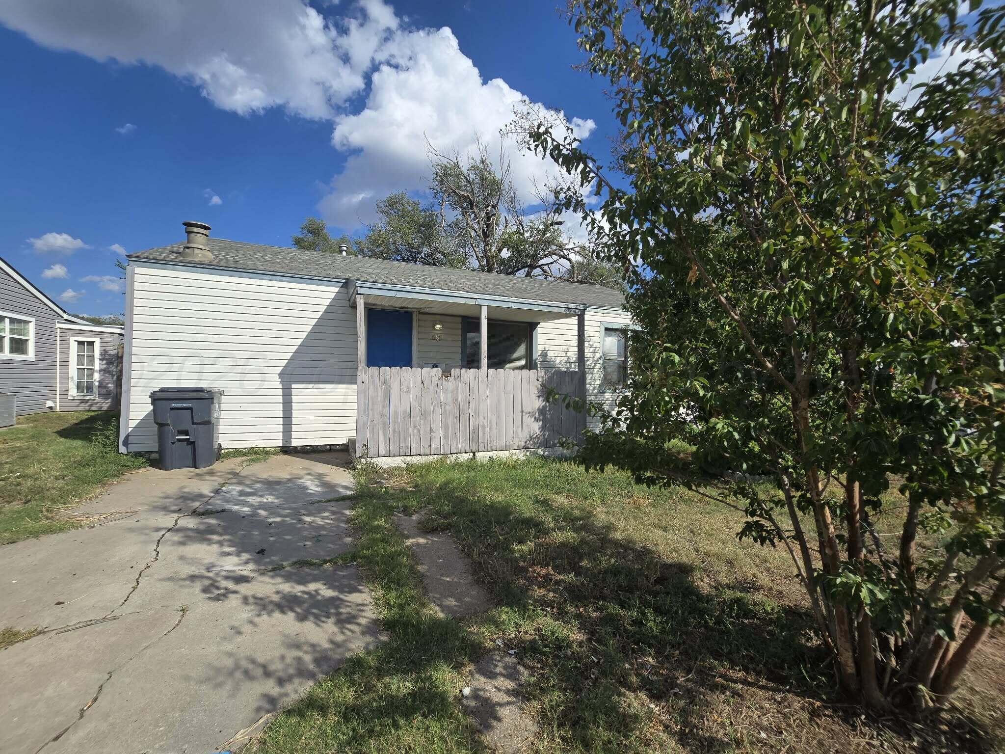 2706 Ridgemere Boulevard Amarillo, TX 79107 - Photo 18 of 49 a view of house with backyard space and garden