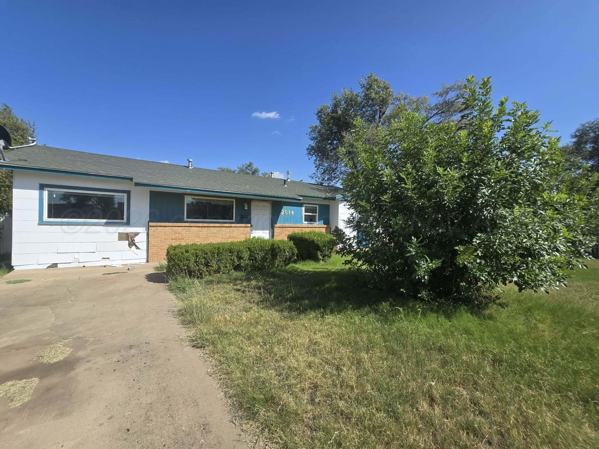 2706 Ridgemere Boulevard Amarillo, TX 79107 - Photo 48 of 49 front view of house with a yard