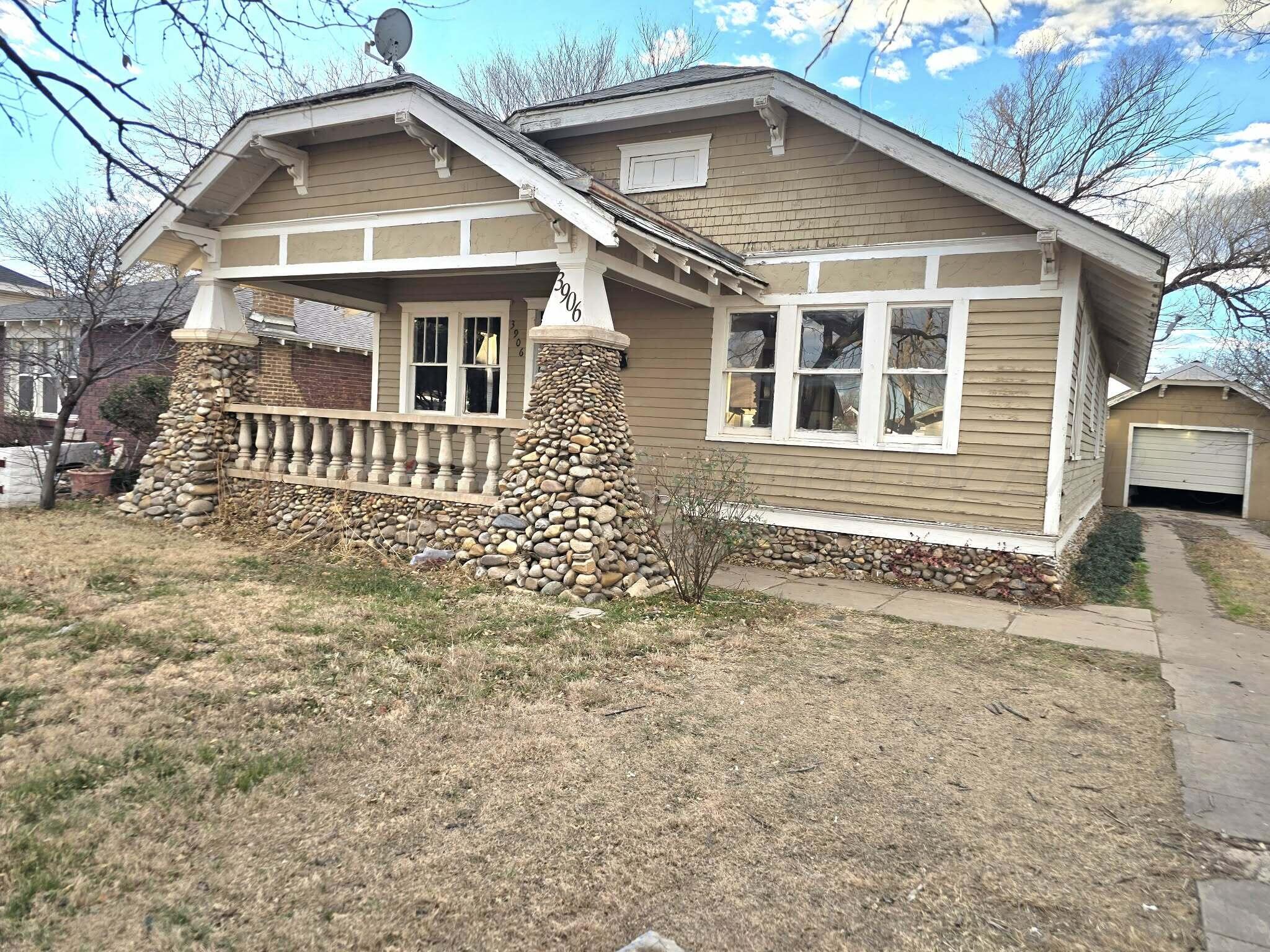 2706 Ridgemere Boulevard Amarillo, TX 79107 - Photo 6 of 49 a front view of a house with a yard