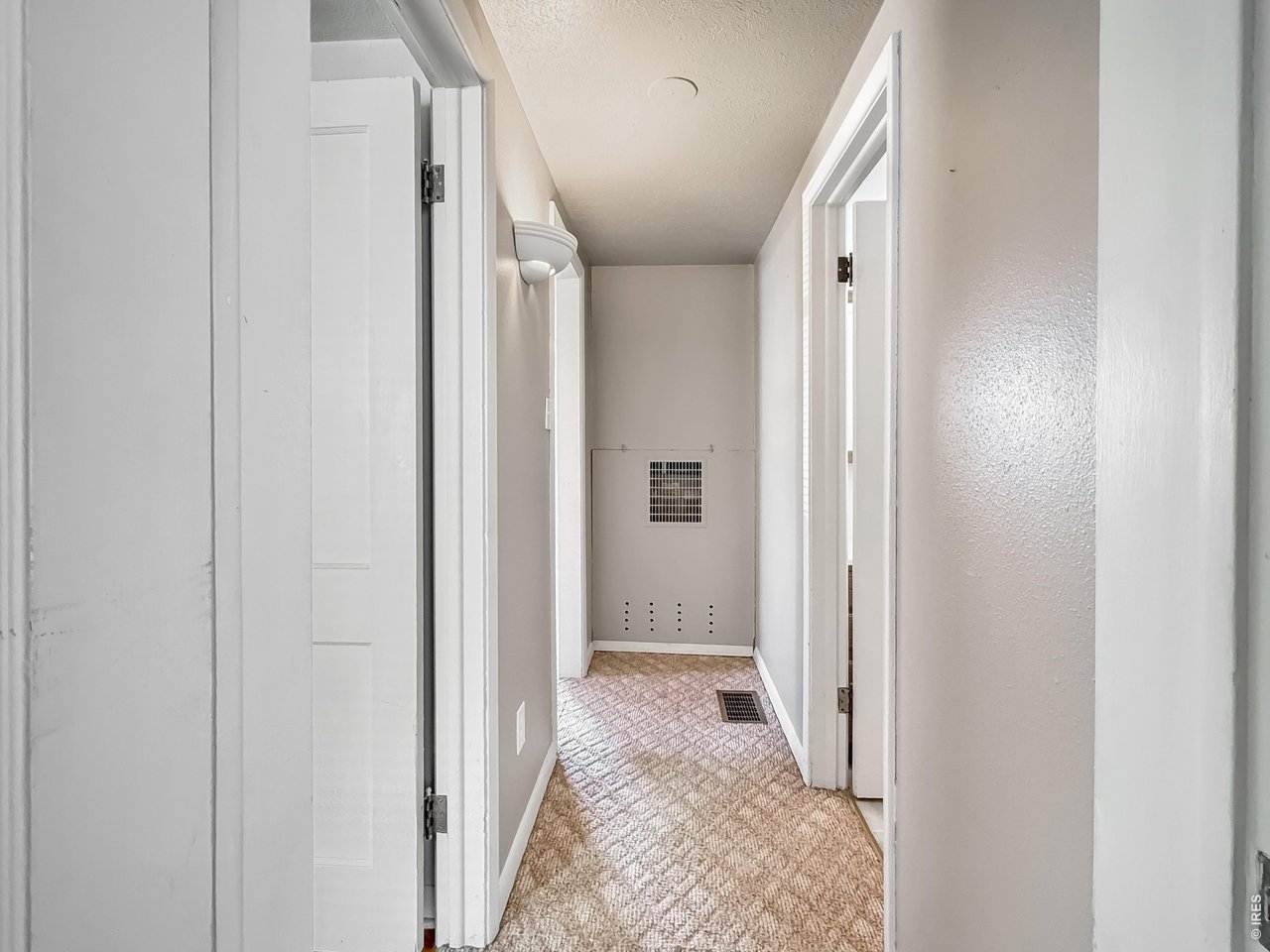525 Cleveland Street Sterling, CO 80751 - Photo 14 of 35 Hallway to Bathroom & bedrooms