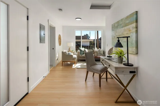 a living room with furniture and a window